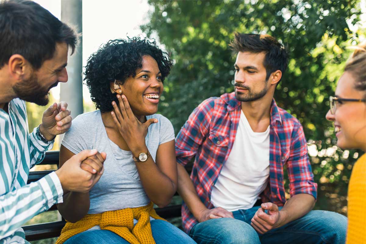 Hearing-to-Heal---How-Hearing-Aids-Can-Support-Mental-Health - social woman - 1200x800